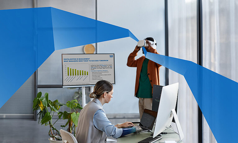 Man with VR headset and woman at a computer