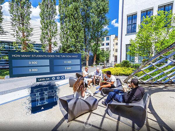 Image within the VR questwhere students are sitting on campus and a question from the quiz is displayed.